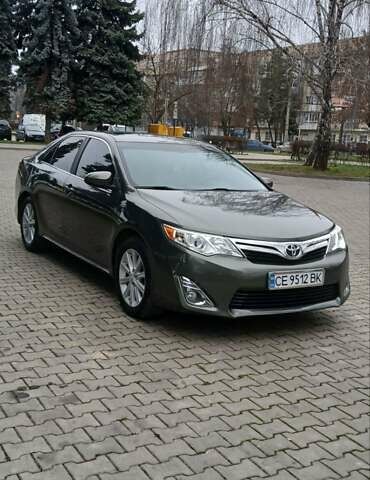 Зеленый Тойота Камри, объемом двигателя 2.5 л и пробегом 230 тыс. км за 11300 $, фото 8 на Automoto.ua