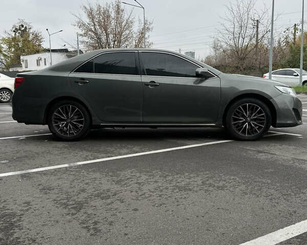 Зелений Тойота Камрі, об'ємом двигуна 2.49 л та пробігом 125 тис. км за 12800 $, фото 6 на Automoto.ua