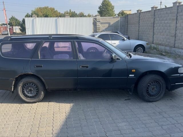 Зелений Тойота Камрі, об'ємом двигуна 2.2 л та пробігом 380 тис. км за 1650 $, фото 3 на Automoto.ua