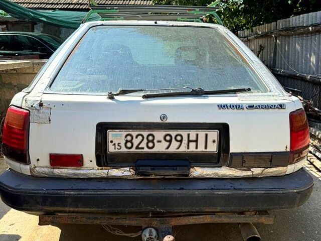 Белый Тойота Карина, объемом двигателя 2 л и пробегом 500 тыс. км за 500 $, фото 3 на Automoto.ua