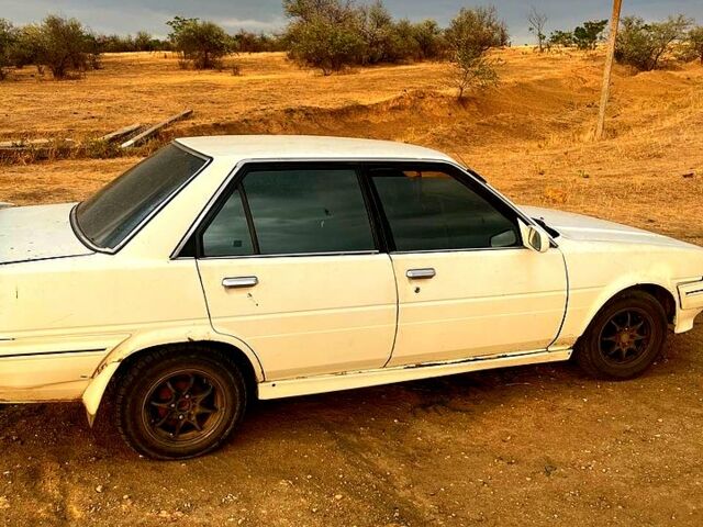 Белый Тойота Карина, объемом двигателя 1.5 л и пробегом 234 тыс. км за 600 $, фото 1 на Automoto.ua