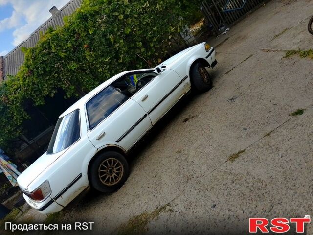 Білий Тойота Каріна, об'ємом двигуна 2 л та пробігом 350 тис. км за 1500 $, фото 3 на Automoto.ua