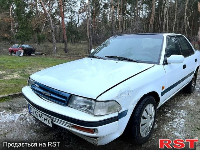 Белый Тойота Карина, объемом двигателя 2 л и пробегом 0 тыс. км за 800 $, фото 1 на Automoto.ua