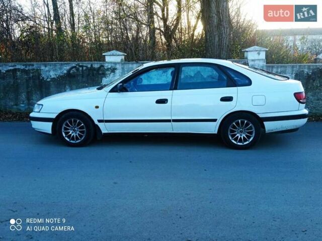 Белый Тойота Карина, объемом двигателя 1.62 л и пробегом 355 тыс. км за 2500 $, фото 3 на Automoto.ua