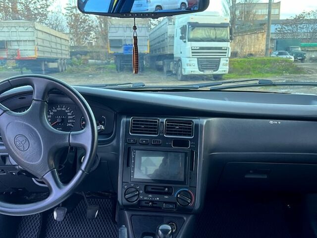 Белый Тойота Карина, объемом двигателя 1.6 л и пробегом 515 тыс. км за 4150 $, фото 6 на Automoto.ua