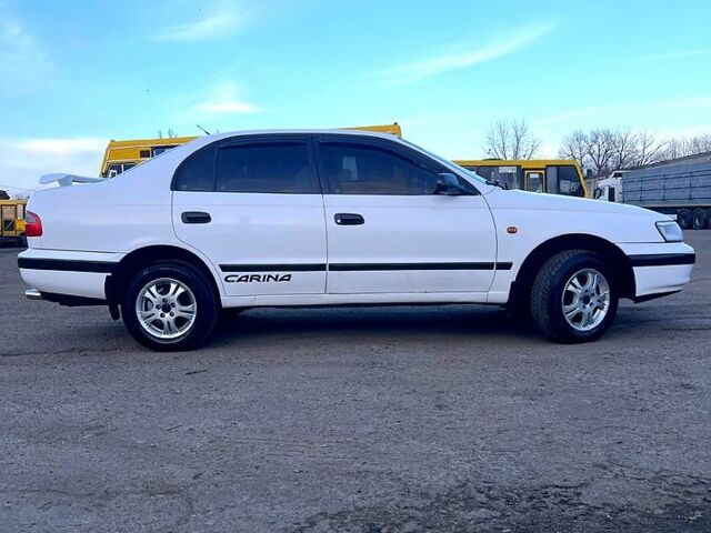 Белый Тойота Карина, объемом двигателя 1.6 л и пробегом 515 тыс. км за 4150 $, фото 3 на Automoto.ua