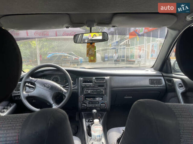 Белый Тойота Карина, объемом двигателя 1.6 л и пробегом 380 тыс. км за 4000 $, фото 4 на Automoto.ua