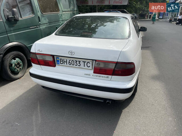 Белый Тойота Карина, объемом двигателя 1.6 л и пробегом 380 тыс. км за 4000 $, фото 3 на Automoto.ua