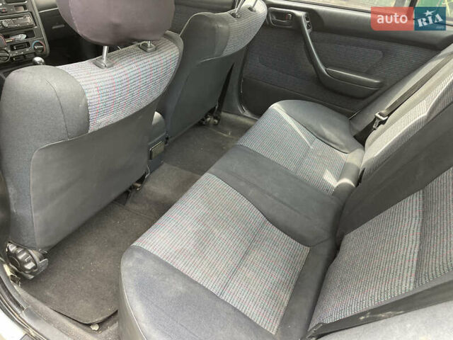 Белый Тойота Карина, объемом двигателя 1.6 л и пробегом 380 тыс. км за 4000 $, фото 5 на Automoto.ua
