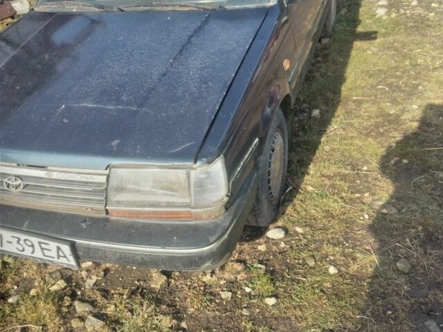 Черный Тойота Карина, объемом двигателя 1 л и пробегом 2 тыс. км за 300 $, фото 1 на Automoto.ua