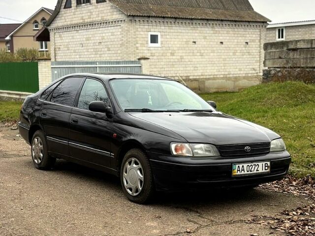 Черный Тойота Карина, объемом двигателя 1.8 л и пробегом 210 тыс. км за 1799 $, фото 3 на Automoto.ua