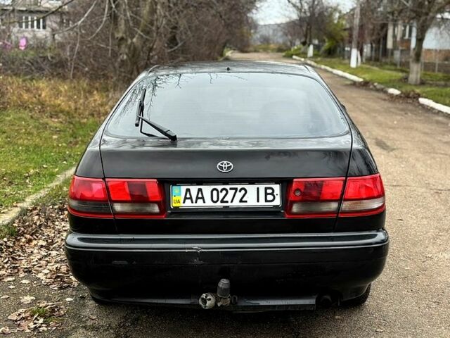 Черный Тойота Карина, объемом двигателя 1.8 л и пробегом 210 тыс. км за 1799 $, фото 5 на Automoto.ua
