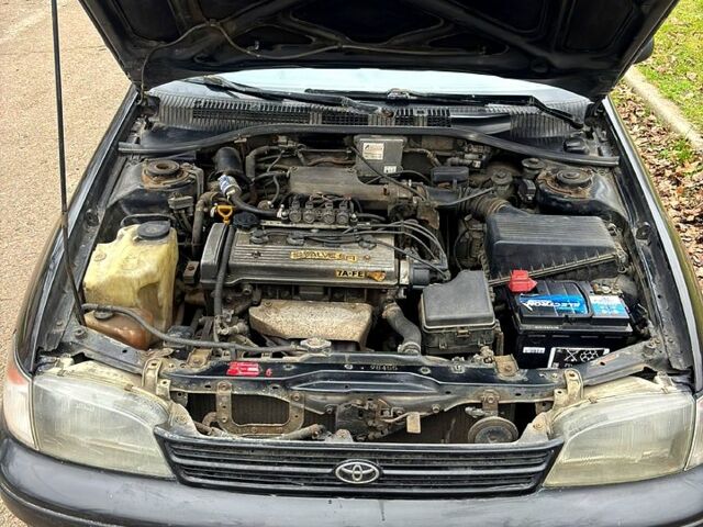 Черный Тойота Карина, объемом двигателя 1.8 л и пробегом 210 тыс. км за 1799 $, фото 10 на Automoto.ua