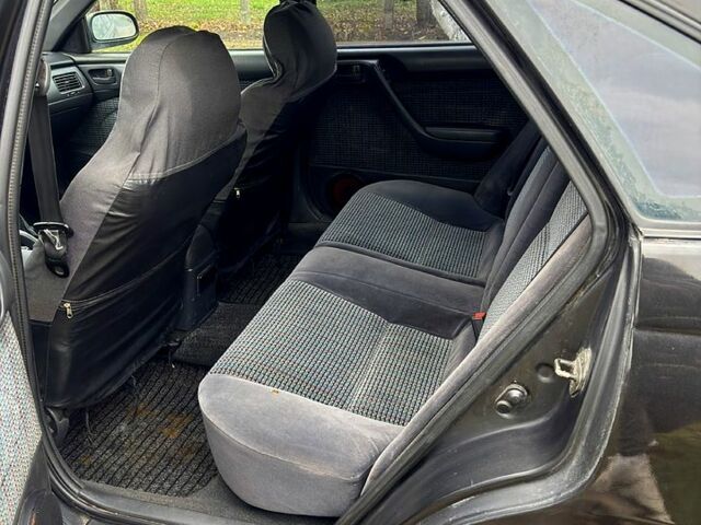 Черный Тойота Карина, объемом двигателя 1.8 л и пробегом 210 тыс. км за 1799 $, фото 8 на Automoto.ua