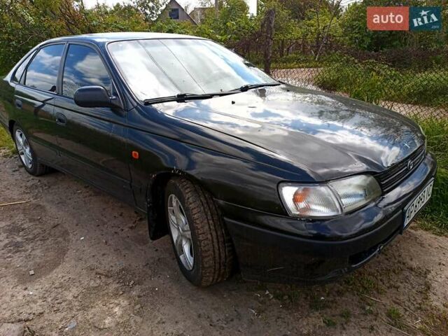 Черный Тойота Карина, объемом двигателя 1.76 л и пробегом 293 тыс. км за 2650 $, фото 4 на Automoto.ua