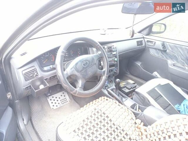 Черный Тойота Карина, объемом двигателя 1.76 л и пробегом 293 тыс. км за 2650 $, фото 1 на Automoto.ua