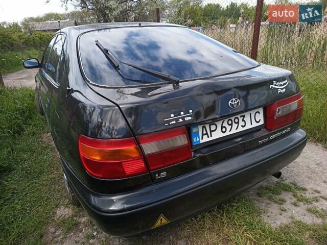 Черный Тойота Карина, объемом двигателя 1.76 л и пробегом 293 тыс. км за 2650 $, фото 3 на Automoto.ua