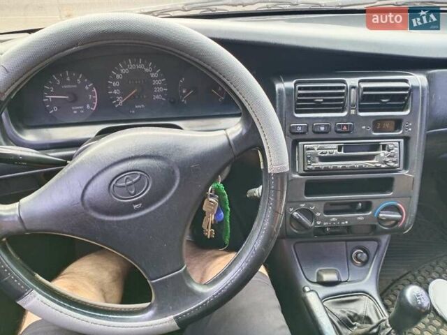 Фиолетовый Тойота Карина, объемом двигателя 1.6 л и пробегом 443 тыс. км за 1800 $, фото 5 на Automoto.ua