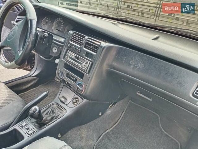 Фиолетовый Тойота Карина, объемом двигателя 1.6 л и пробегом 443 тыс. км за 1800 $, фото 6 на Automoto.ua