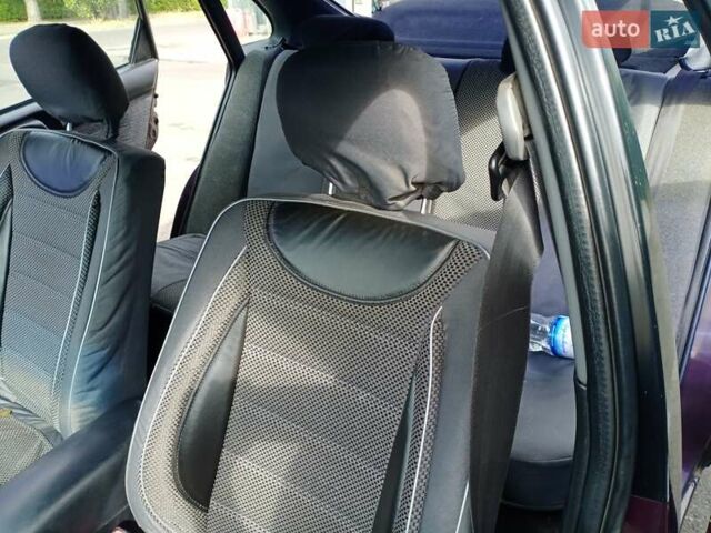 Фиолетовый Тойота Карина, объемом двигателя 1.6 л и пробегом 443 тыс. км за 1800 $, фото 3 на Automoto.ua