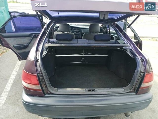 Фиолетовый Тойота Карина, объемом двигателя 1.6 л и пробегом 443 тыс. км за 1800 $, фото 9 на Automoto.ua