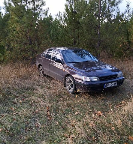 Коричневий Тойота Каріна, об'ємом двигуна 2 л та пробігом 320 тис. км за 2500 $, фото 2 на Automoto.ua