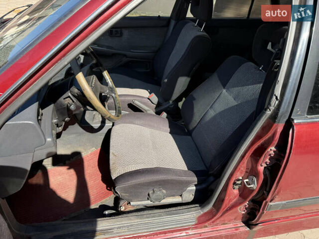 Красный Тойота Карина, объемом двигателя 2 л и пробегом 333 тыс. км за 1375 $, фото 8 на Automoto.ua