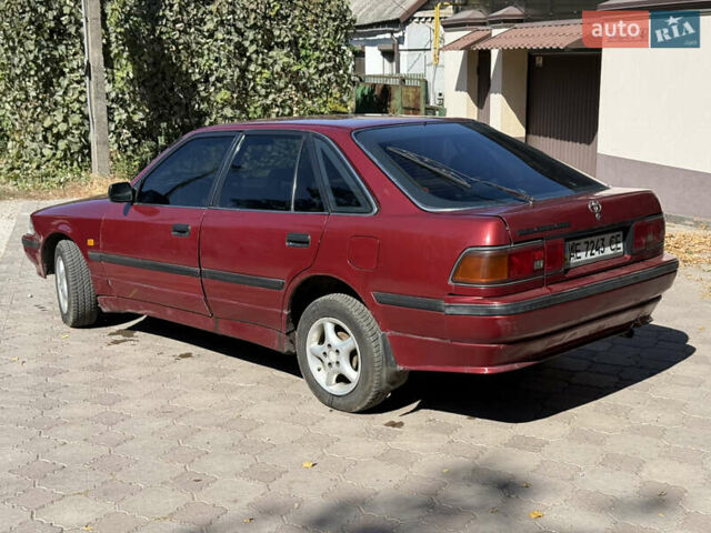 Красный Тойота Карина, объемом двигателя 2 л и пробегом 333 тыс. км за 1375 $, фото 5 на Automoto.ua