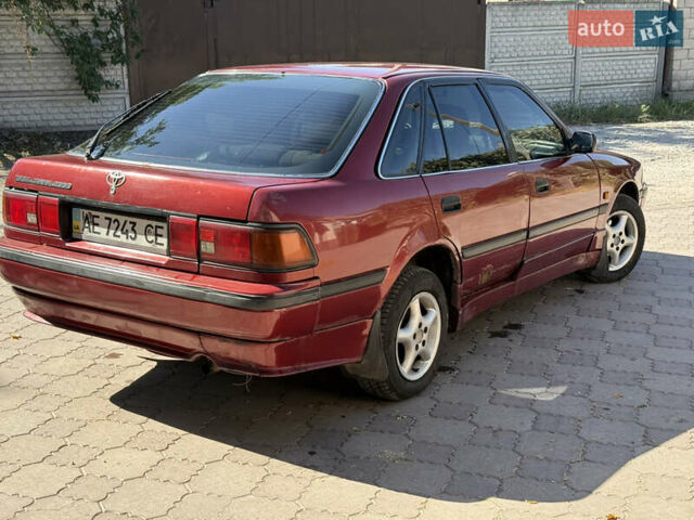 Красный Тойота Карина, объемом двигателя 2 л и пробегом 333 тыс. км за 1375 $, фото 3 на Automoto.ua