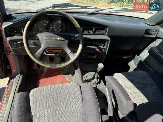 Красный Тойота Карина, объемом двигателя 2 л и пробегом 333 тыс. км за 1375 $, фото 10 на Automoto.ua