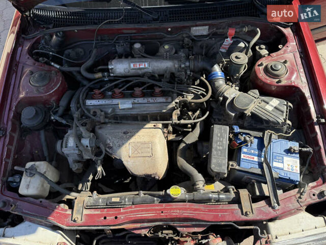 Красный Тойота Карина, объемом двигателя 2 л и пробегом 333 тыс. км за 1375 $, фото 6 на Automoto.ua
