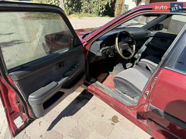 Красный Тойота Карина, объемом двигателя 2 л и пробегом 333 тыс. км за 1375 $, фото 7 на Automoto.ua