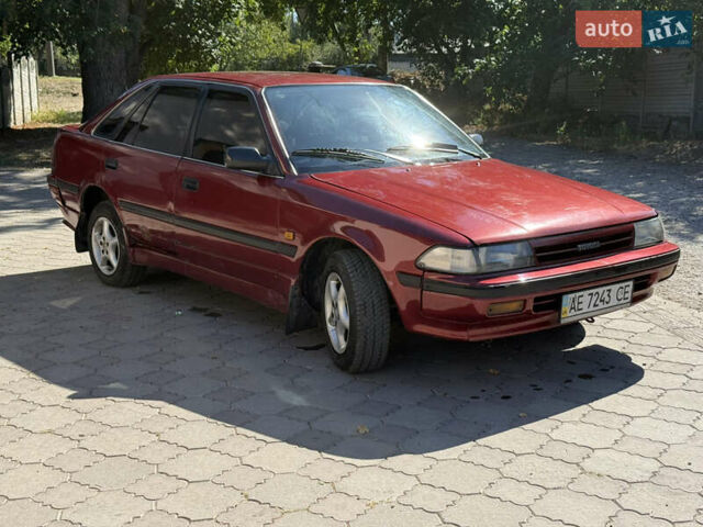 Красный Тойота Карина, объемом двигателя 2 л и пробегом 333 тыс. км за 1375 $, фото 2 на Automoto.ua