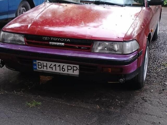 Красный Тойота Карина, объемом двигателя 2 л и пробегом 350 тыс. км за 1600 $, фото 2 на Automoto.ua