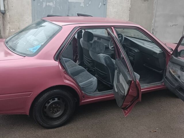 Червоний Тойота Каріна, об'ємом двигуна 0 л та пробігом 484 тис. км за 1500 $, фото 1 на Automoto.ua