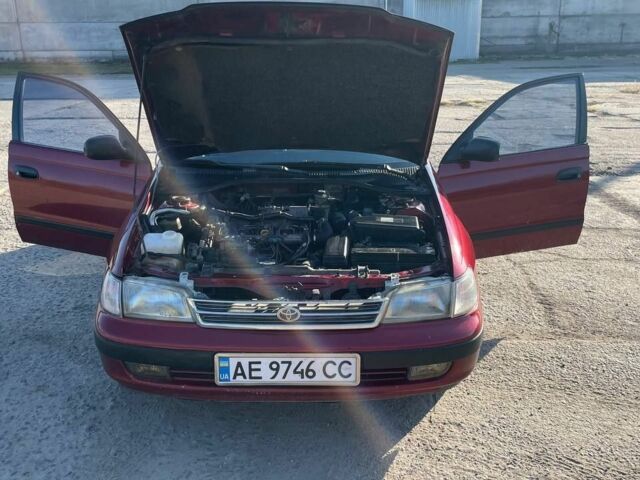 Красный Тойота Карина, объемом двигателя 2 л и пробегом 320 тыс. км за 3500 $, фото 5 на Automoto.ua