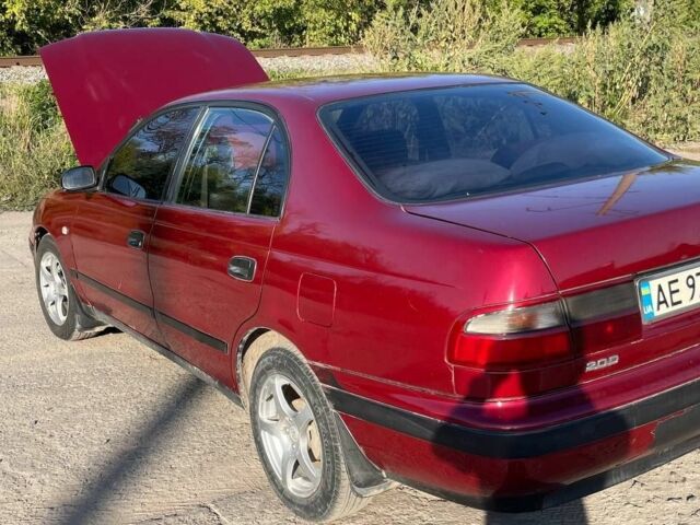 Красный Тойота Карина, объемом двигателя 2 л и пробегом 320 тыс. км за 3500 $, фото 16 на Automoto.ua