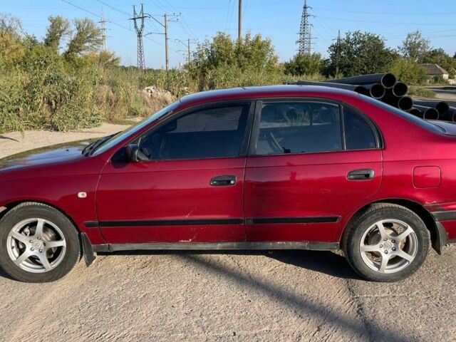 Красный Тойота Карина, объемом двигателя 2 л и пробегом 320 тыс. км за 3500 $, фото 19 на Automoto.ua