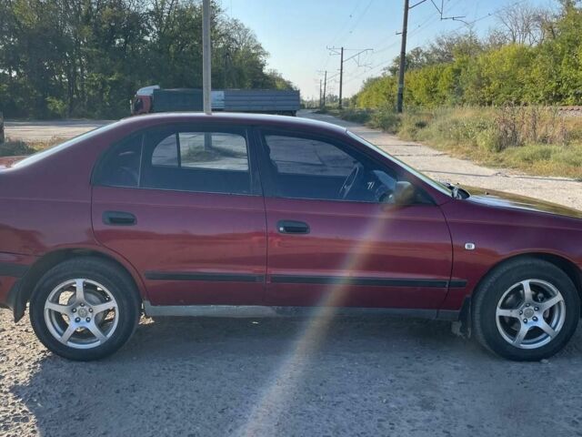 Красный Тойота Карина, объемом двигателя 2 л и пробегом 320 тыс. км за 3500 $, фото 21 на Automoto.ua