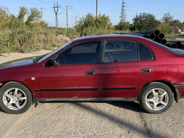 Красный Тойота Карина, объемом двигателя 2 л и пробегом 380 тыс. км за 2500 $, фото 17 на Automoto.ua