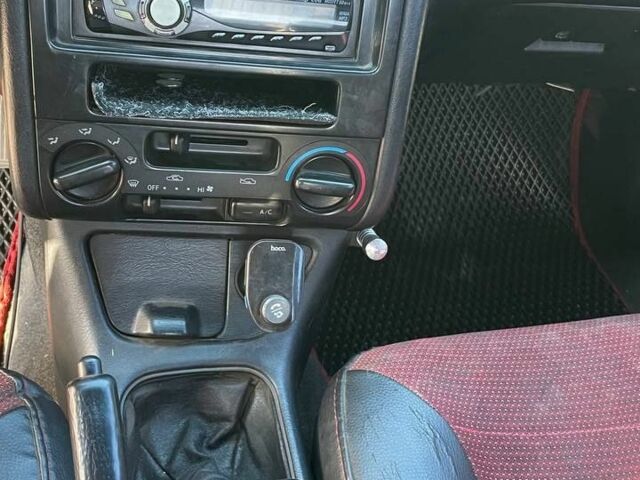 Красный Тойота Карина, объемом двигателя 2 л и пробегом 320 тыс. км за 3500 $, фото 12 на Automoto.ua