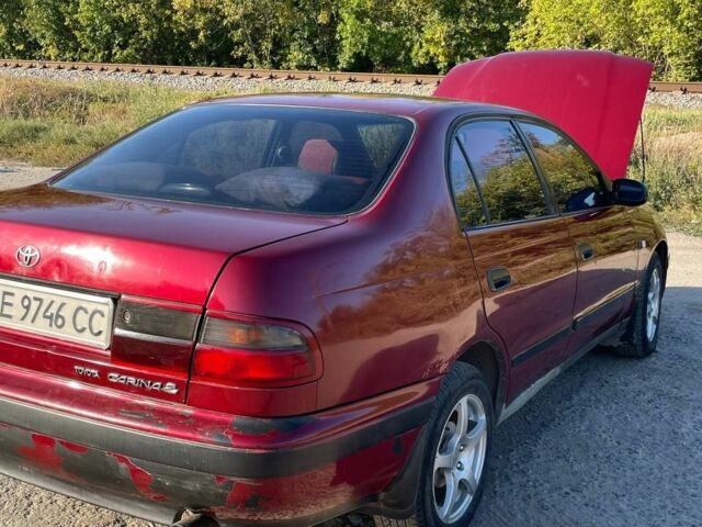 Красный Тойота Карина, объемом двигателя 2 л и пробегом 320 тыс. км за 3500 $, фото 3 на Automoto.ua