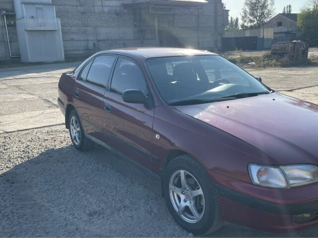 Красный Тойота Карина, объемом двигателя 2 л и пробегом 380 тыс. км за 2500 $, фото 4 на Automoto.ua