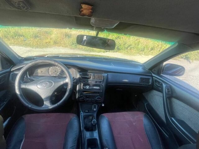 Красный Тойота Карина, объемом двигателя 2 л и пробегом 320 тыс. км за 3500 $, фото 7 на Automoto.ua