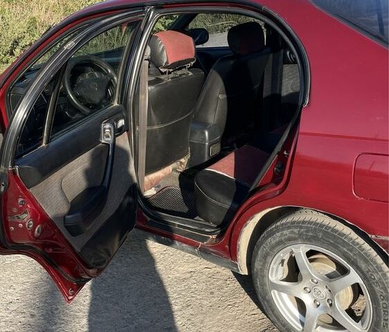 Красный Тойота Карина, объемом двигателя 2 л и пробегом 380 тыс. км за 2500 $, фото 7 на Automoto.ua