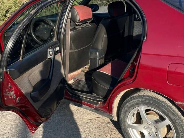 Красный Тойота Карина, объемом двигателя 2 л и пробегом 320 тыс. км за 3500 $, фото 10 на Automoto.ua