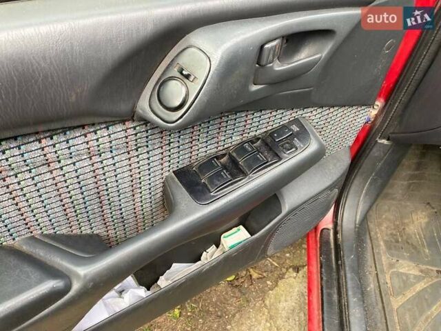 Красный Тойота Карина, объемом двигателя 1.76 л и пробегом 428 тыс. км за 2800 $, фото 4 на Automoto.ua