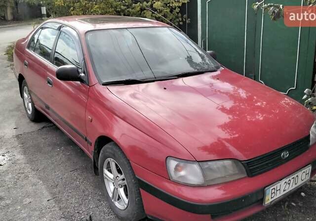 Красный Тойота Карина, объемом двигателя 1.76 л и пробегом 428 тыс. км за 2800 $, фото 12 на Automoto.ua