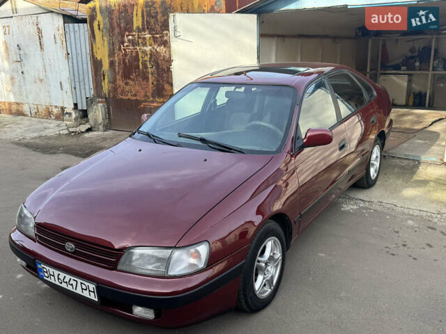 Красный Тойота Карина, объемом двигателя 1.6 л и пробегом 259 тыс. км за 2800 $, фото 7 на Automoto.ua