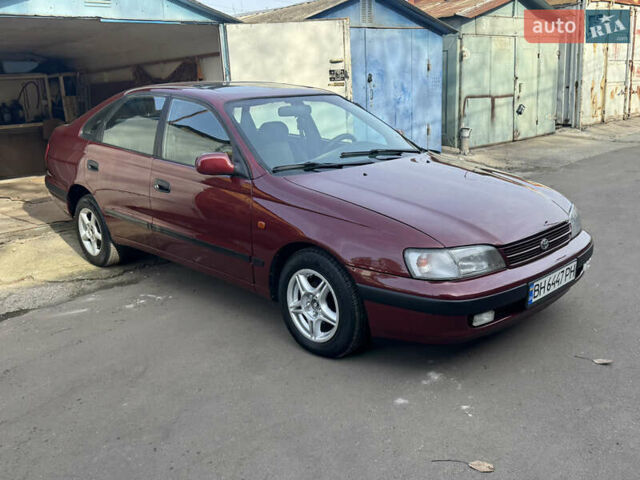 Красный Тойота Карина, объемом двигателя 1.6 л и пробегом 259 тыс. км за 2800 $, фото 6 на Automoto.ua